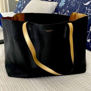 Tory Burch gold/ black soft leather tote.